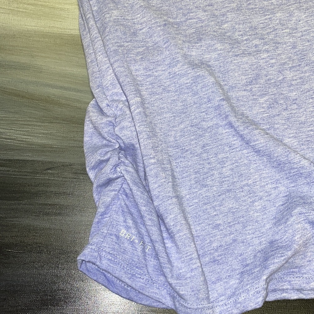 Nike short sleeved dri-fit women’s XL fits like a large. - Picture 3 of 9
